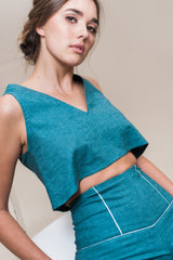 Sleeveless boxy crop top made from recycled poly and hemp chambray.